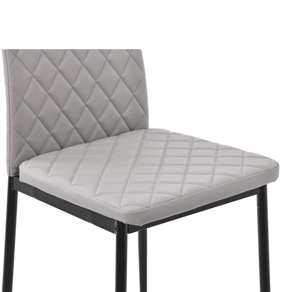 Salvo Dining Chairs in Beige Colour Leather and Black Metal Legs