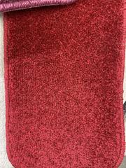 Luxury red carpet on show in a Coventry carpet shop